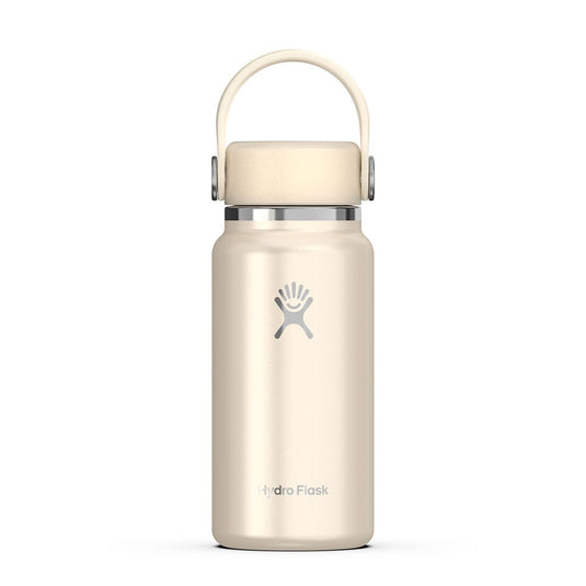 Beige Hydro Flask water bottle with a silver lid on a white background