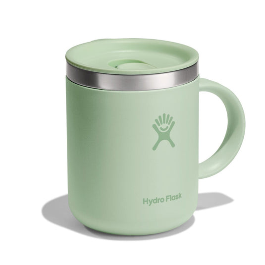 Light green Hydro Flask mug with silver lid on a white background