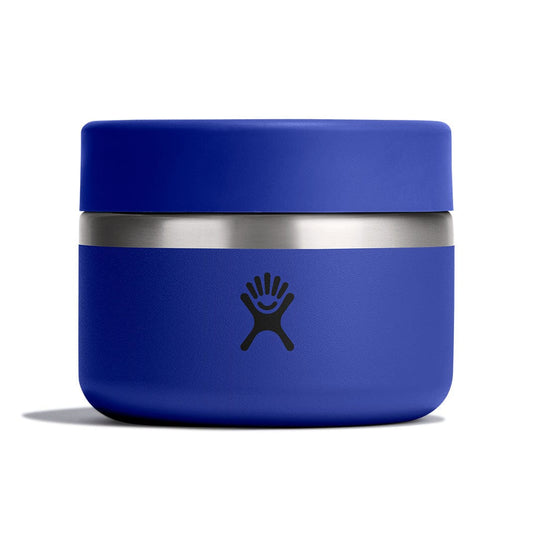 Blue thermos with silver base on a white background