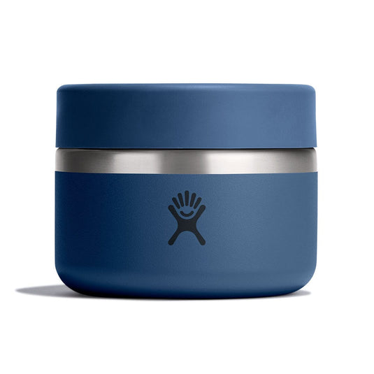 Blue thermos with silver base on a white background