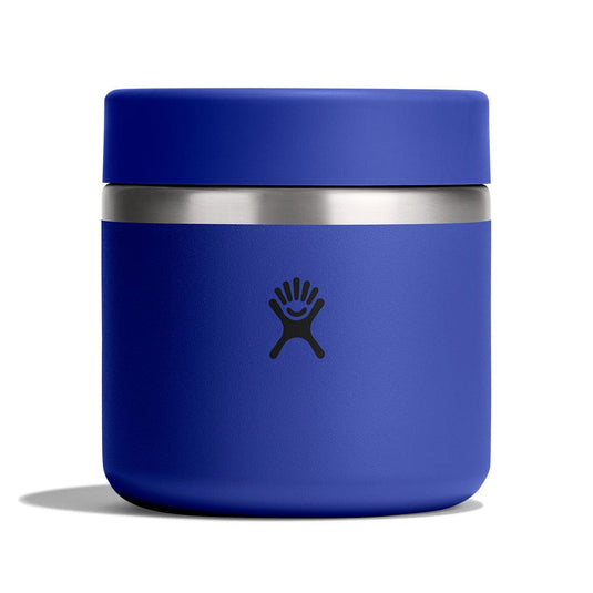 Blue thermos with silver base on a white background