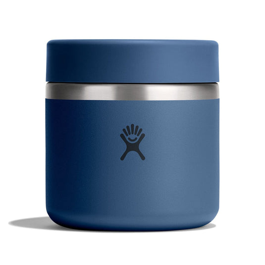 Blue thermos with silver base on a white background