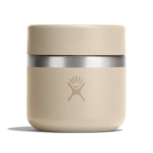 Beige insulated mug with silver band on a white background