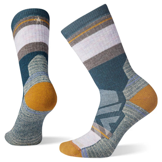 A pair of Smartwool women's hike crew socks with a geometric pattern in shades of purple, red, and gray.