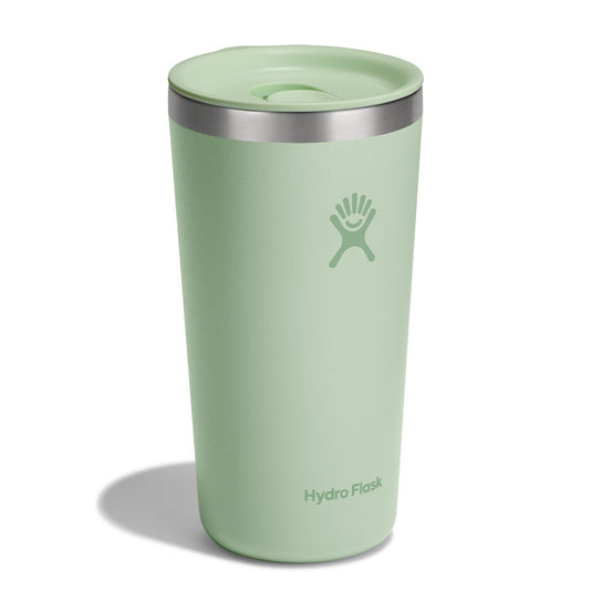 Green Hydro Flask tumbler on a white background