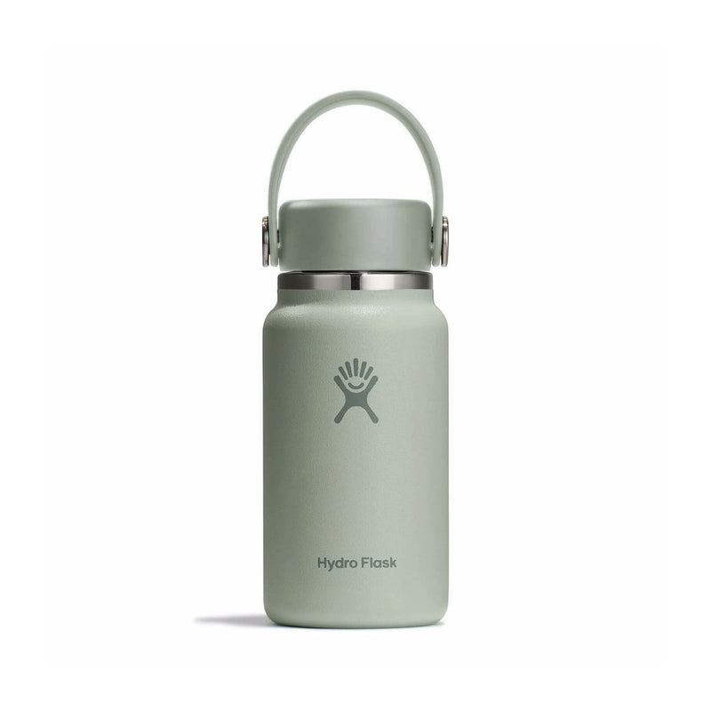 Load image into Gallery viewer, Green Hydro Flask water bottle with a carrying lid on a white background
