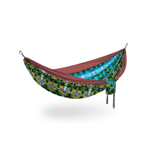 Colorful hammock with tie-dye pattern on a white background