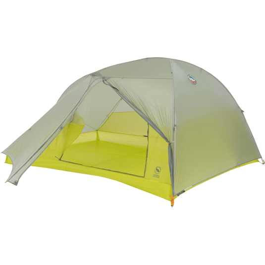Green camping tent with a white background
