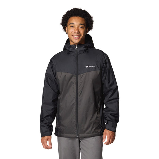 Person wearing a black Columbia jacket on a white background