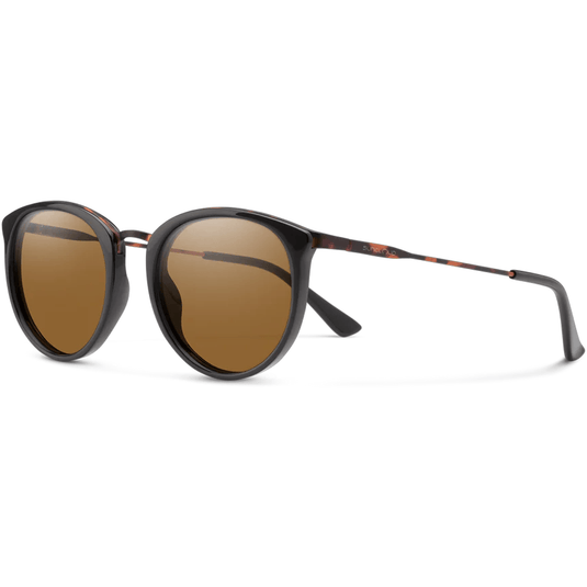 Sunglasses with brown lenses and black/brown frame on a white background