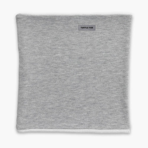 Gray neck gaiter with a brand label on a white background