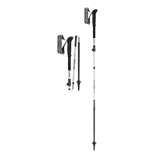 Two black and white hiking poles on a white background