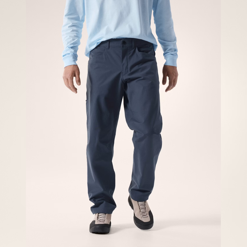 Load image into Gallery viewer, Person wearing a light blue long-sleeve shirt and dark blue pants on a white background
