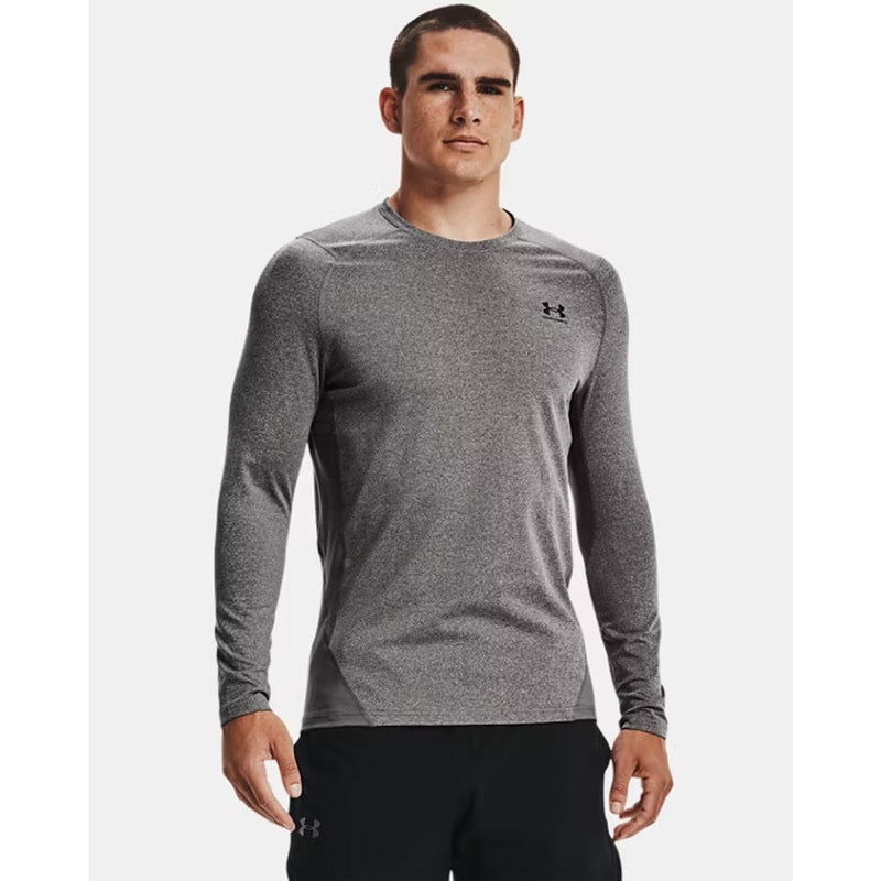 Load image into Gallery viewer, Man wearing a gray long-sleeve athletic shirt with a brand logo on a white background
