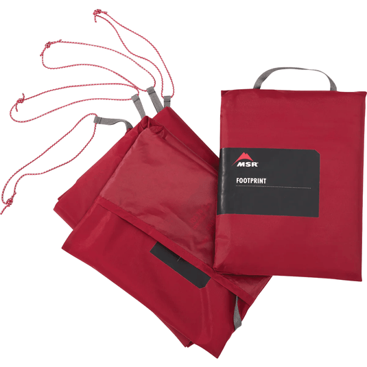 Red camping footprint with straps on a white background