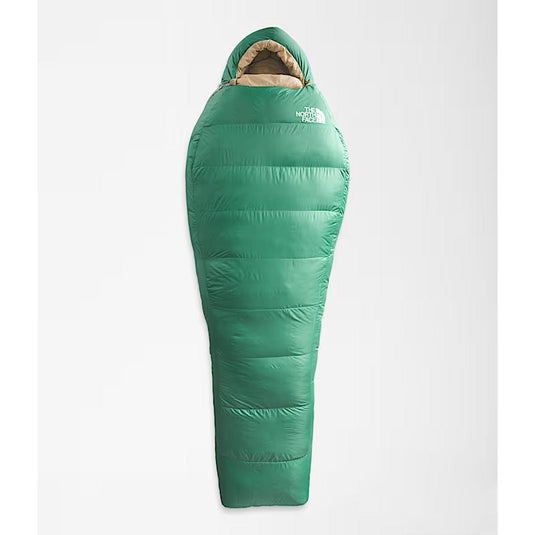 Green sleeping bag with The North Face logo on a white background