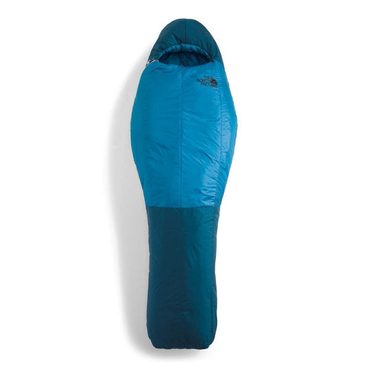 Blue sleeping bag with The North Face logo on a white background