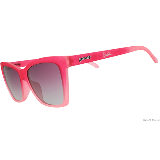 Pink sunglasses with 'Barbie' branding on a white background