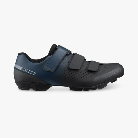 Blue and black cycling shoe on a white background