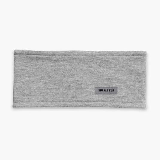 Gray headband with a brand label on a white background
