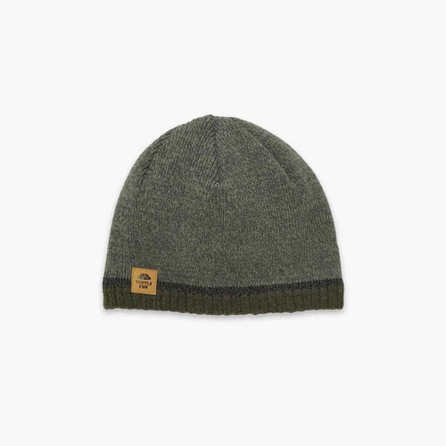 Green knit beanie with a brand label on a white background