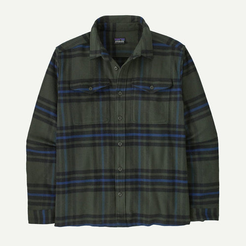 Green and blue plaid shirt on a white background