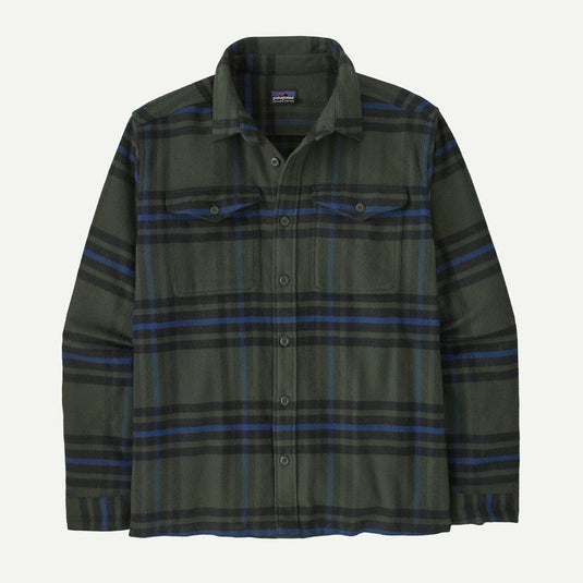 Green and blue plaid shirt on a white background
