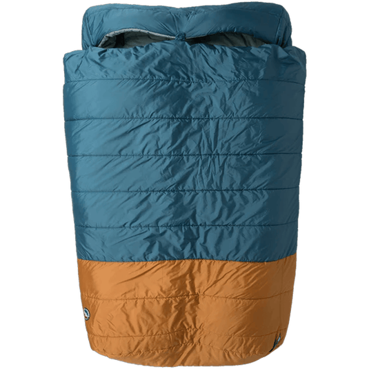 Two-toned blue and brown sleeping bag on a white background