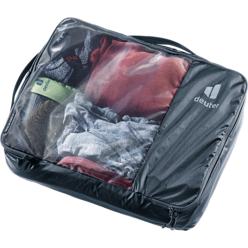 Load image into Gallery viewer, Gray packing cube with clothes inside, featuring the Deuter brand logo.
