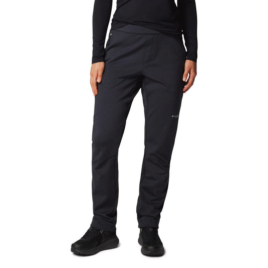 Black pants worn by a person on a white background