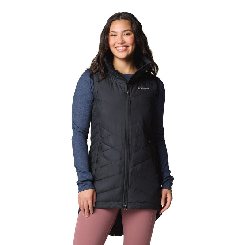 Load image into Gallery viewer, Woman wearing a black insulated vest over a blue long-sleeve shirt on a white background
