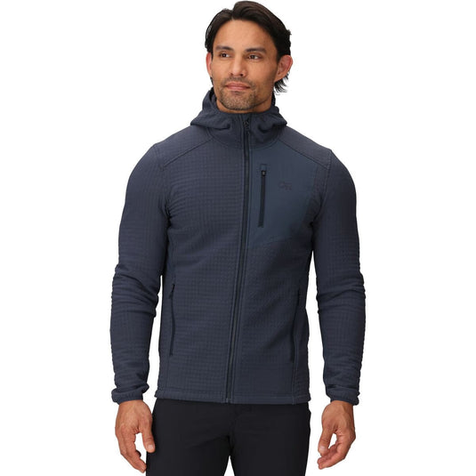 Man wearing a dark blue jacket on a white background
