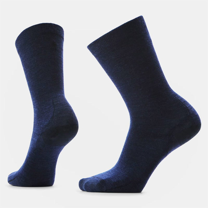 Load image into Gallery viewer, Pair of dark blue socks on a light gray background
