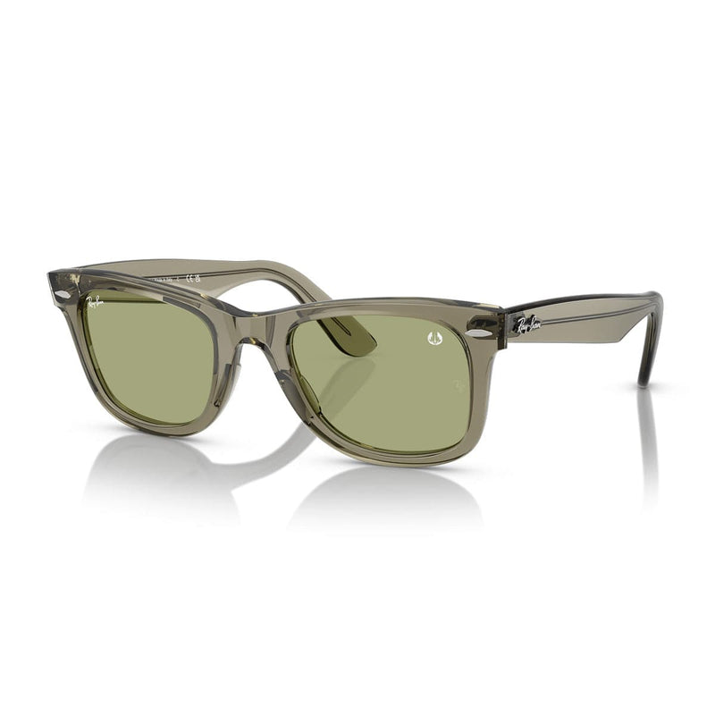 Load image into Gallery viewer, Sunglasses with green lenses and transparent frame on a white background
