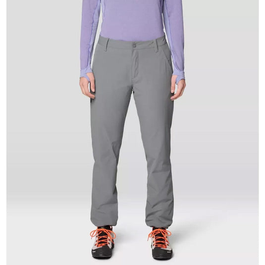 Person wearing gray pants and a light purple long-sleeve shirt on a white background