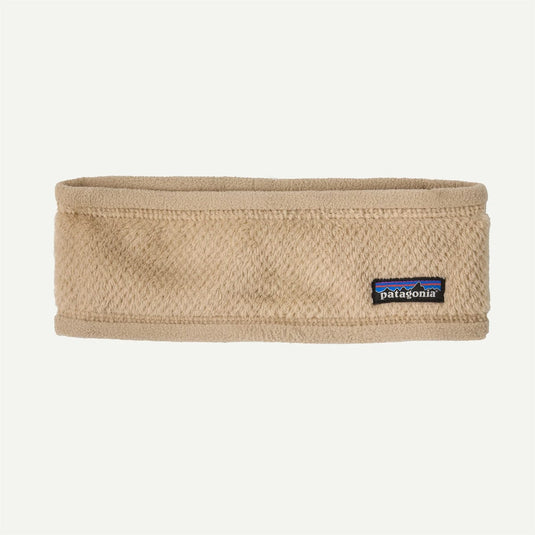 Beige headband with Patagonia logo on a beige background