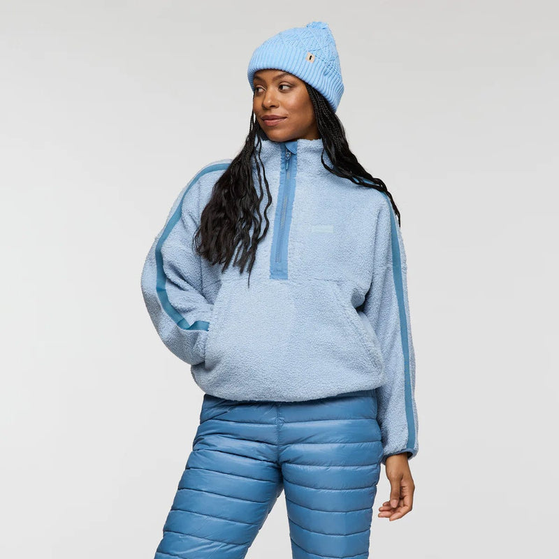 Load image into Gallery viewer, Person wearing a blue fleece pullover and pants with a matching beanie on a white background
