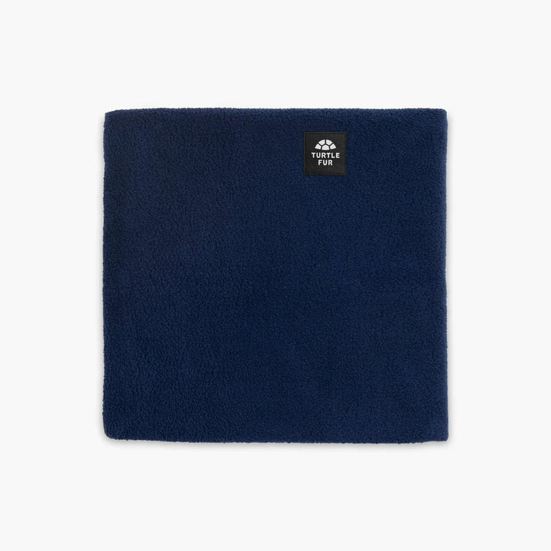 Load image into Gallery viewer, Navy blue neck warmer with a brand label on a light gray background
