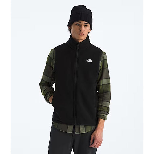 Person wearing a black North Face vest with camouflage sleeves on a white background