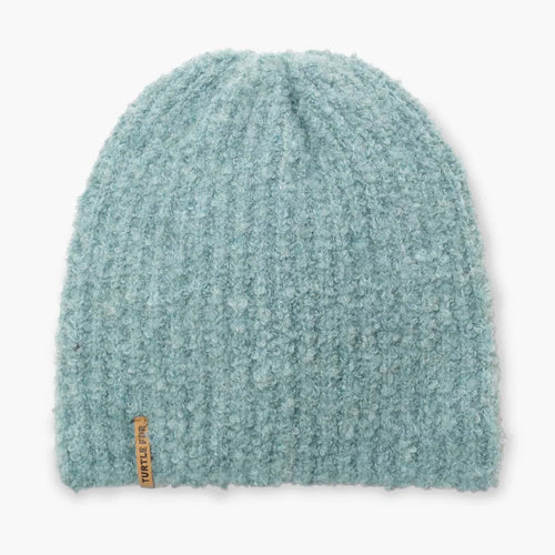 Textured light blue beanie on a white background