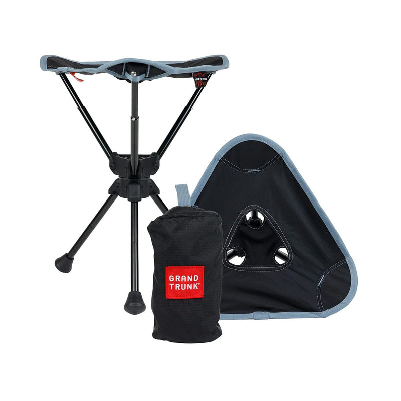 Load image into Gallery viewer, Portable stool with carrying bag and pouch on a white background, featuring 'Grand Trunk' branding.
