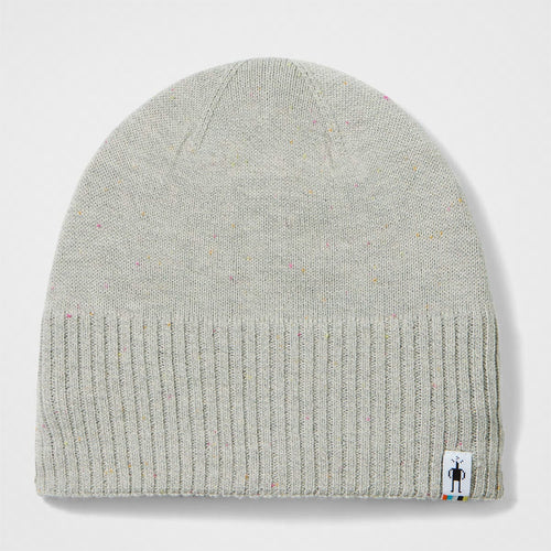 Gray knit beanie with a brand label on a light gray background
