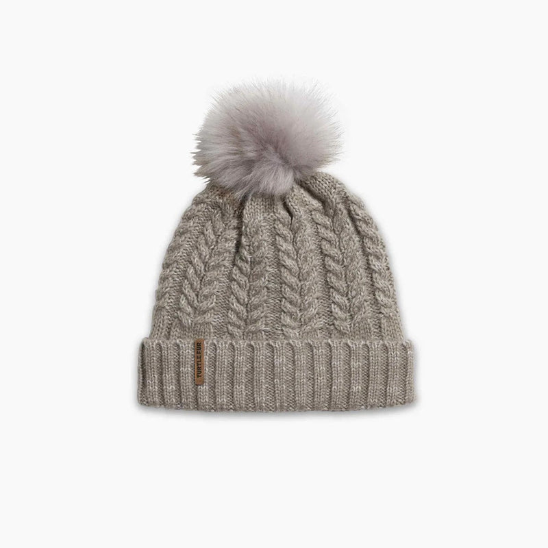 Load image into Gallery viewer, Knitted beanie with pom-pom on a white background
