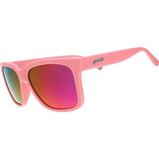 Pink sunglasses with a colorful lens on a white background
