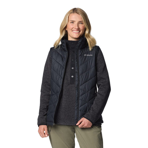 Woman wearing a Columbia jacket on a white background