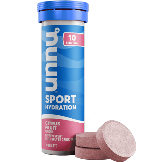 Yummi Sport Hydration tube with pink tablets on a white background