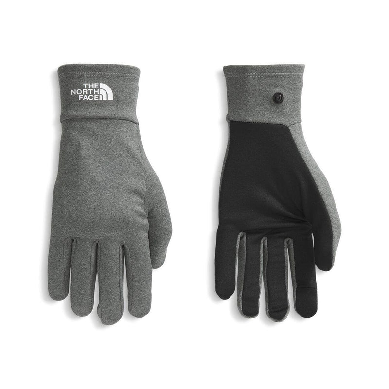 Load image into Gallery viewer, Pair of gray and black gloves with The North Face logo on a white background
