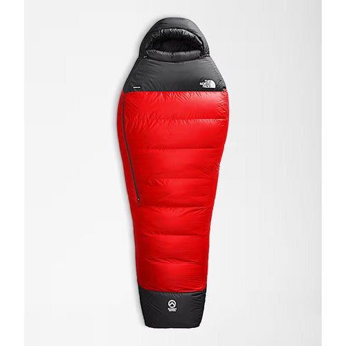 Red and black sleeping bag with The North Face logo on a light gray background