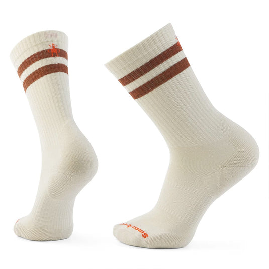 Pair of cream socks with brown stripes on a white background