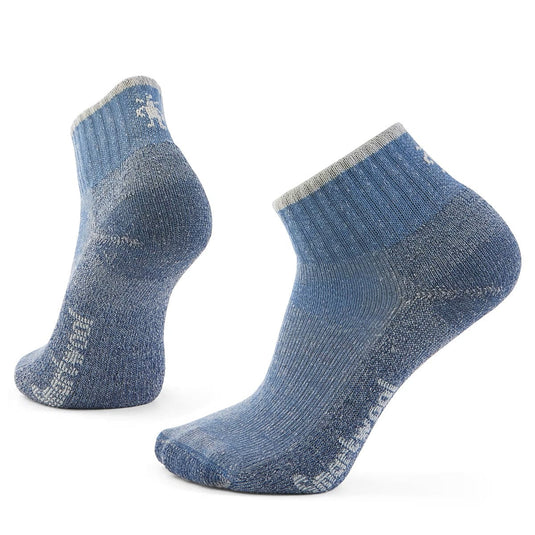 Pair of blue socks with gray accents on a white background